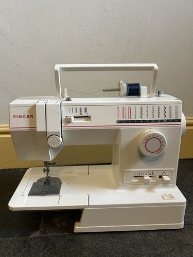 Singer sewing machine - singer,