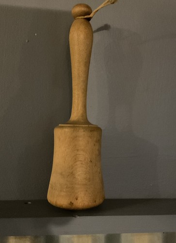 Vintage wooden mallet potato