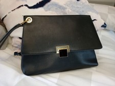 Faith Ladies Black Wristlet Handbag Gold Hardware Inner Pocket Flap Closure 