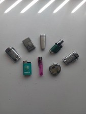 Eight cigarette lighters - cigarette,