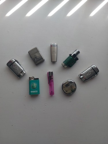 Eight cigarette lighters - cigarette,