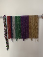 Mardi Gras Bead Necklaces x 90  Various colours. From Universal Studios
