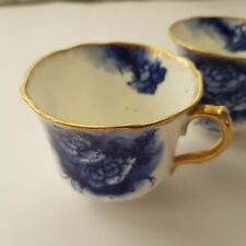 Ceramic tea cups pair carnation flower blue white gilt vintage England 1937