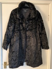 Coat, faux fur, worn without