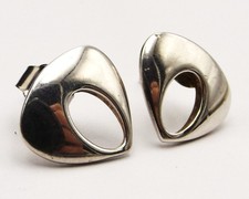 Sterling silver stud earrings small abstract shape with cut out section by Ortak