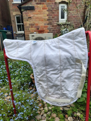 Two white dressage numnahs - ,