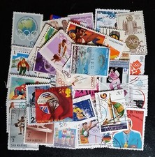 30 all different used Olympics themed postage stamps