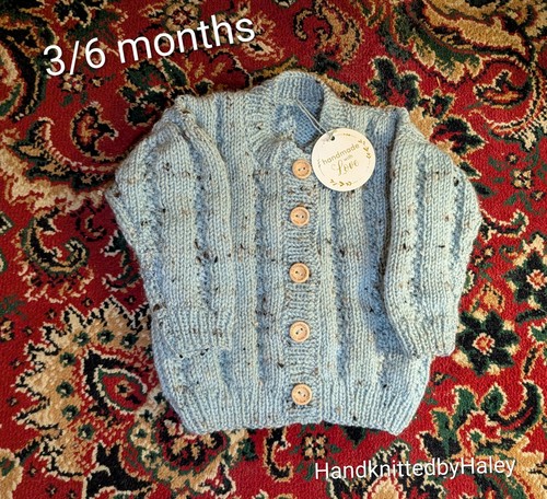 Hand knitted boy - hand, cardigan