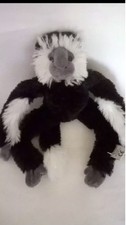 MONKEY BLACK WHITE GREY HANGS JOINS HANDS FEET RAVENSDEN RUSHDEN ZOO SOFT ANIMAL