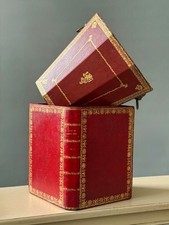 A MATCHED PAIR OF CHERRY RED ANTIQUE LEATHER COUNTRY HOUSE WASTE PAPER BINS