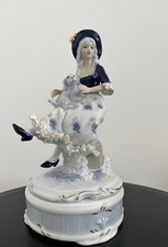Porcelain figurine with - porcelain, wind
