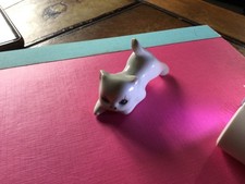 vintage porcelain miniature stretching cat figurine, no markings