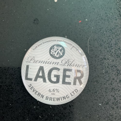 Premium pilsner larger round - larger,