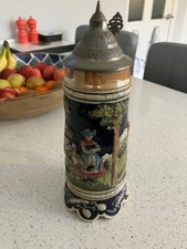 Vintage German beer Stein jug with swiss music movement and pewter lid