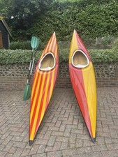 Fibreglass kayak, great design with paddle and spray skirt 