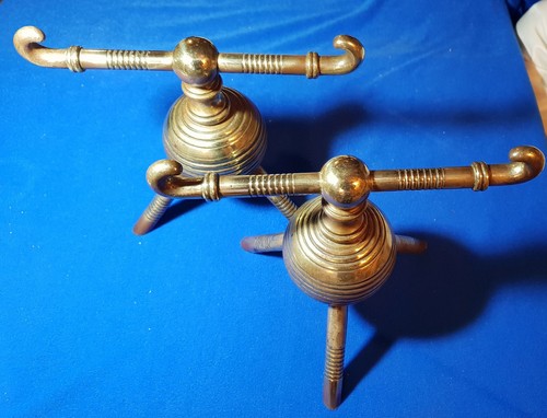 Pair antique brass fire - of,
