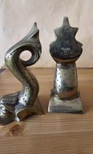 Brass book ends - ends:, design