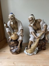 Two Mudman Collectible Chinese