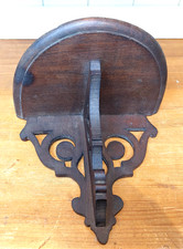 Vintage ornate wooden wall shelf,  carved candle sconce, church statue