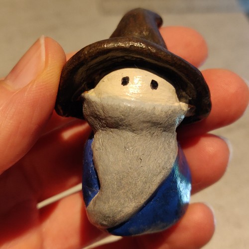 Blue robed wizard - , desk