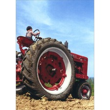 Little Boy Driving Big Red