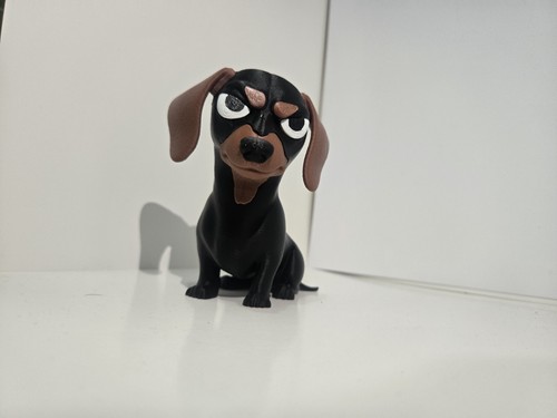 Grumpy dachshund statue - dachshund, |