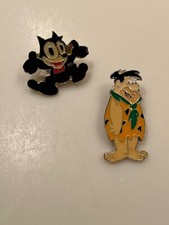Two Metal /Enamel Stud Badges