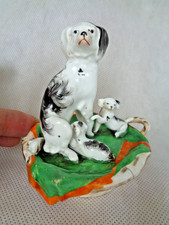 19TH CENTURY STAFFORDSHIRE PORCELAIN FIGURE GROUP SPANIEL & PUPPIES IN BASKET
