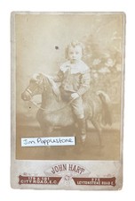 Boy On Toy Rocking Horse