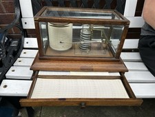 Beautiful Traditional barograph with draw for spare charts in a Rosewood case.