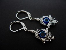 A TIBETAN SILVER  HAMSA HAND