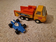 Vintage Tonka racing car transport truck and racing car