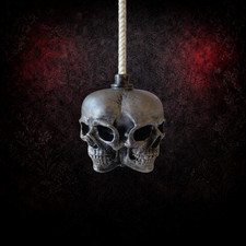 Conjoined Skulls Light Pull |