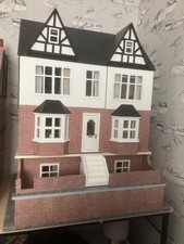 Doll's house with basement. Timber framed, fully furnished