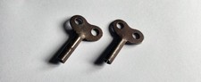 Two vintage antique clock keys