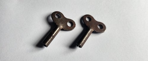 Two vintage antique clock keys