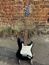 SILVERTONE STRATOCASTER ELECTRIC GUITAR. Made in Korea.