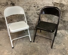 PAIR OF BLACK & WHITE METAL HABITAT FOLDING CHAIRS