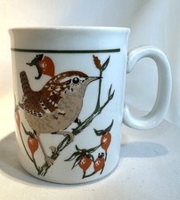 RSPB  Wren And Rose Hips Bird
