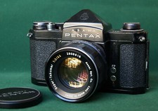 Black bodied Asahi Pentax S1a SLR Camera with Super Takumar f2 55mm Lens