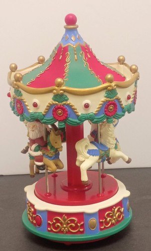 Avon santa caroling carousel - avon, santa's