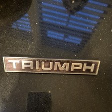 TRIUMPH  BADGE 
