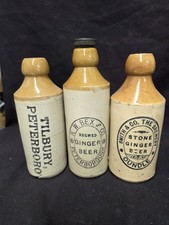 3 Stoneware Bottles From