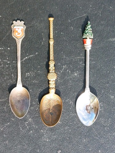 Three ornate teaspoons - ornate,