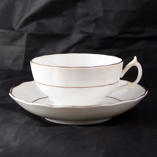 White china cup and - white,