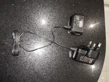 Black & Decker 9.6v-18v charger model no S009ACB2400021 tested and working 