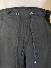black linen trousers, with