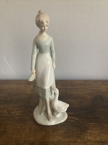 Porcelain figurine ornament - porcelain,