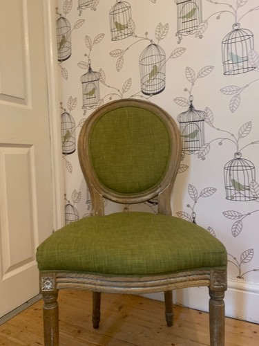 Decorative green fabric chair