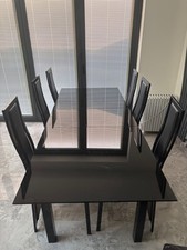 extending dining table and 6 chairs used